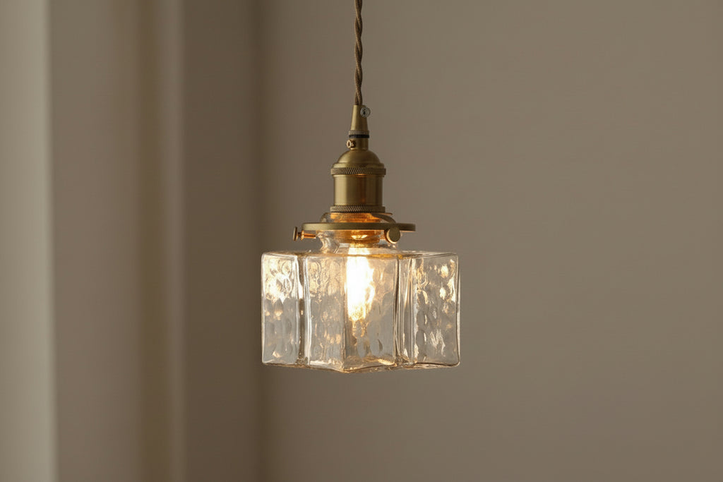 Pendant light with dimensions marked on a plain background